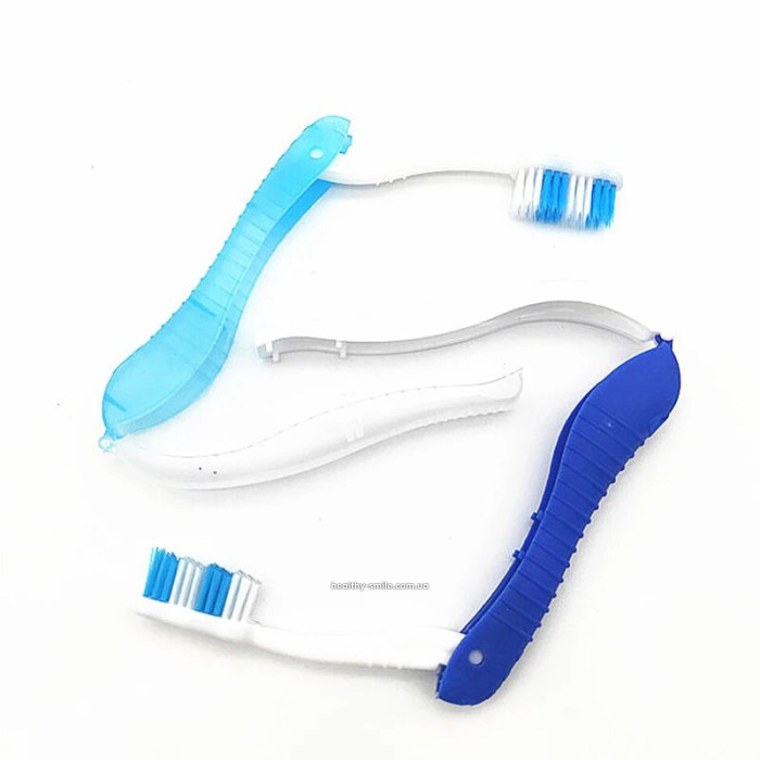 Travel folding toothbrush, yellow